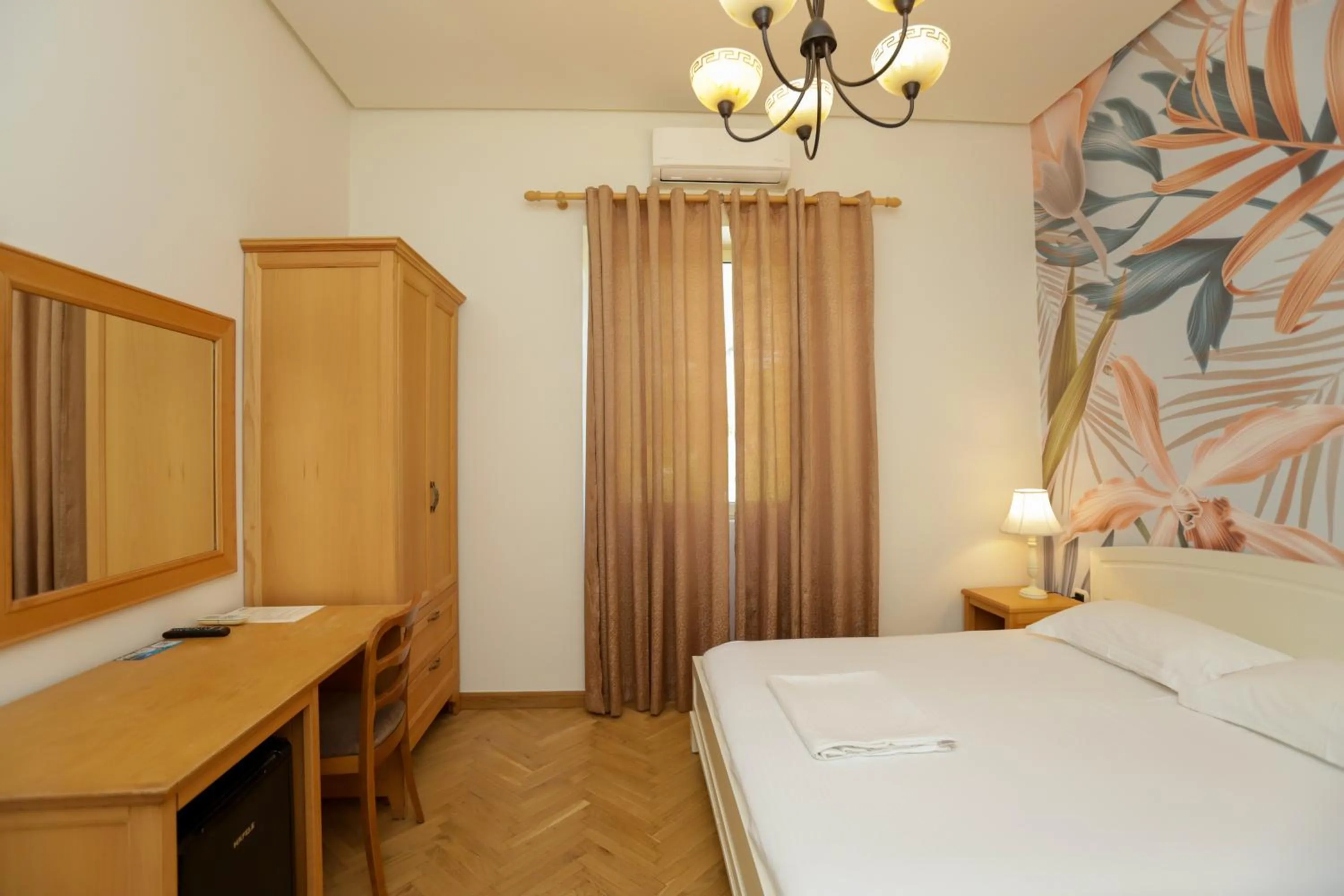 Bedroom in Le Palazzine Hotel