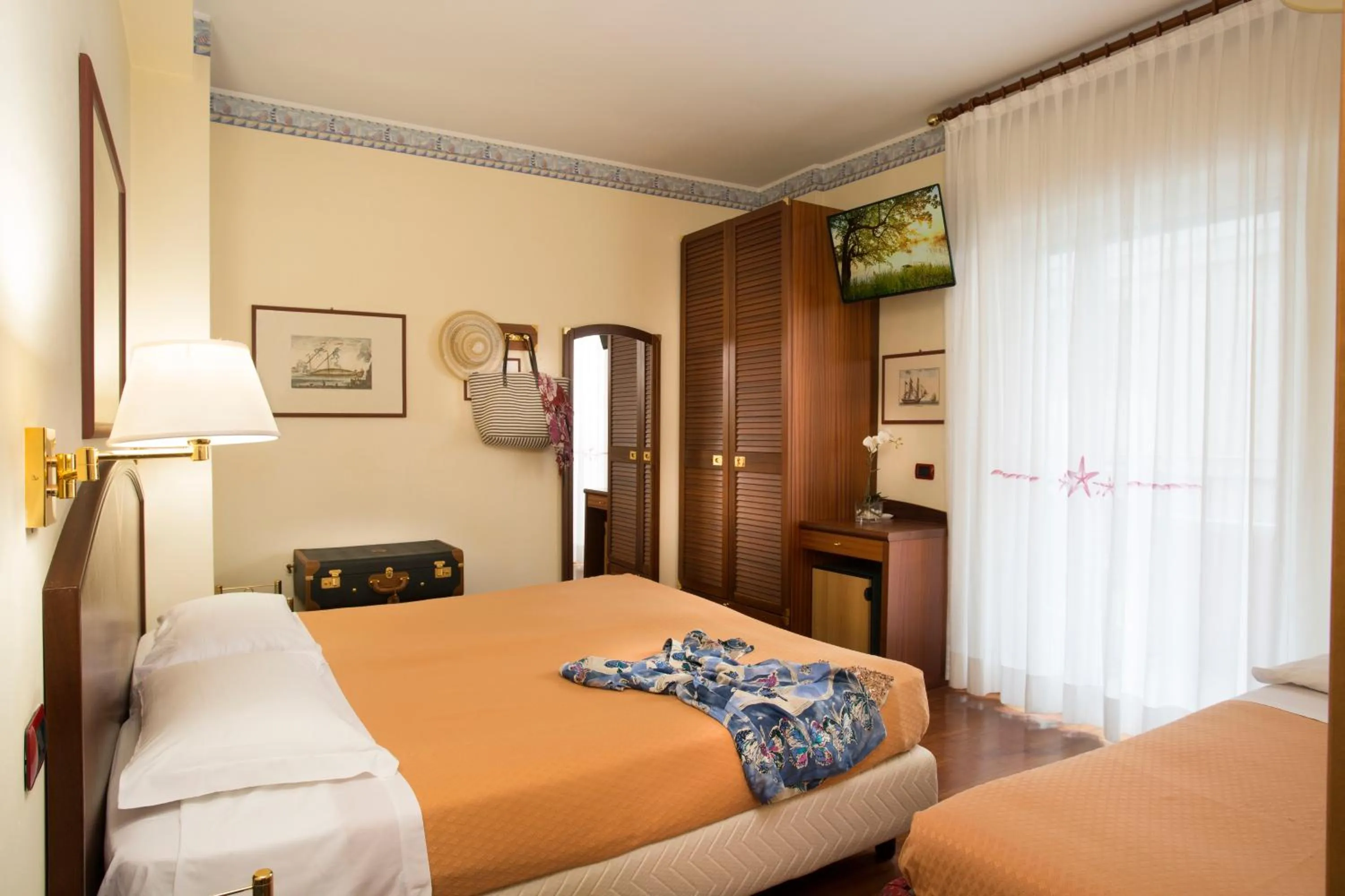 Bed in Atilius Hotel & Suites