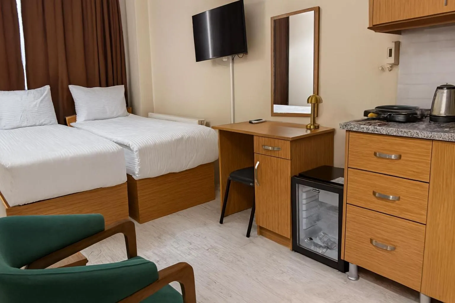 Bed in Lion Stone Hotel