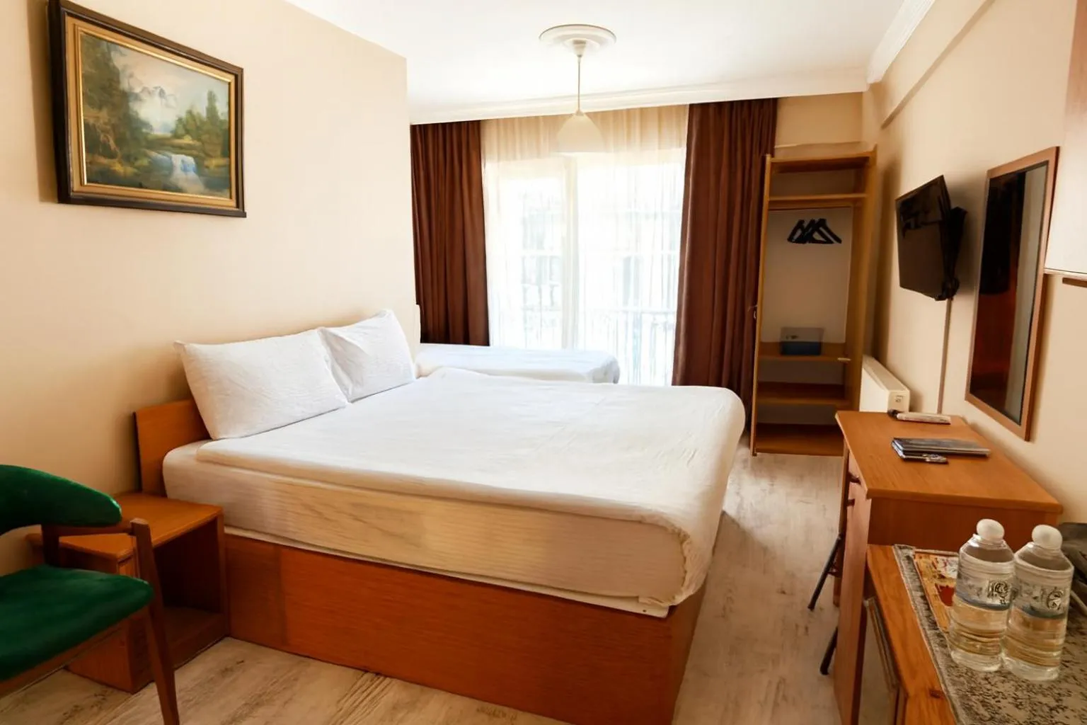 Bed in Lion Stone Hotel