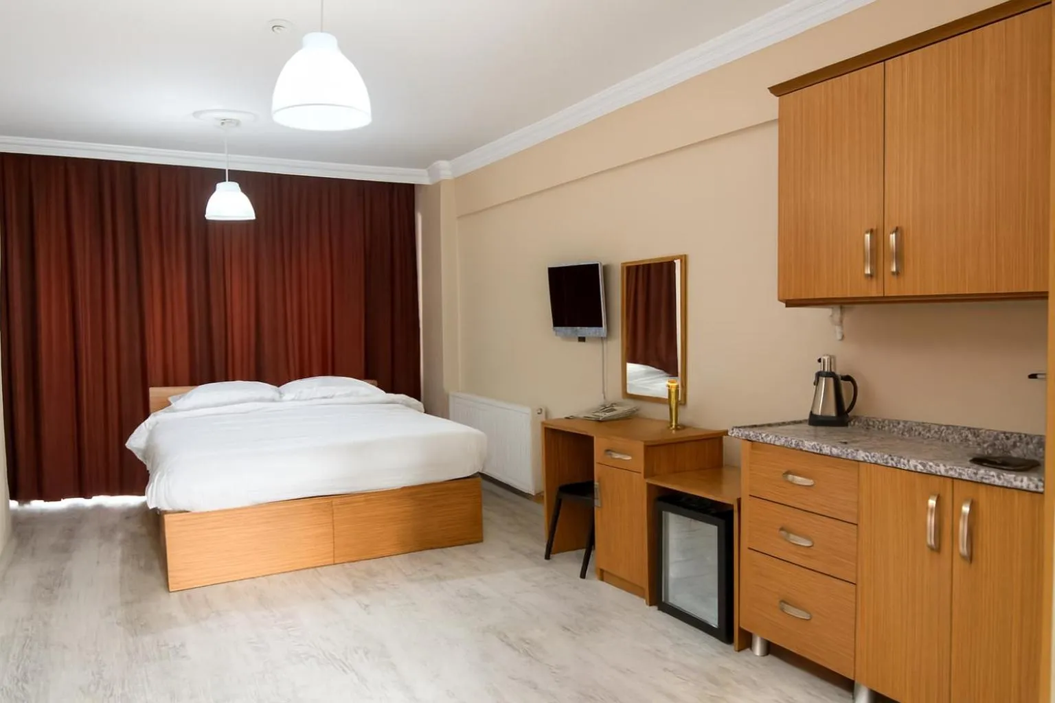 Bed in Lion Stone Hotel