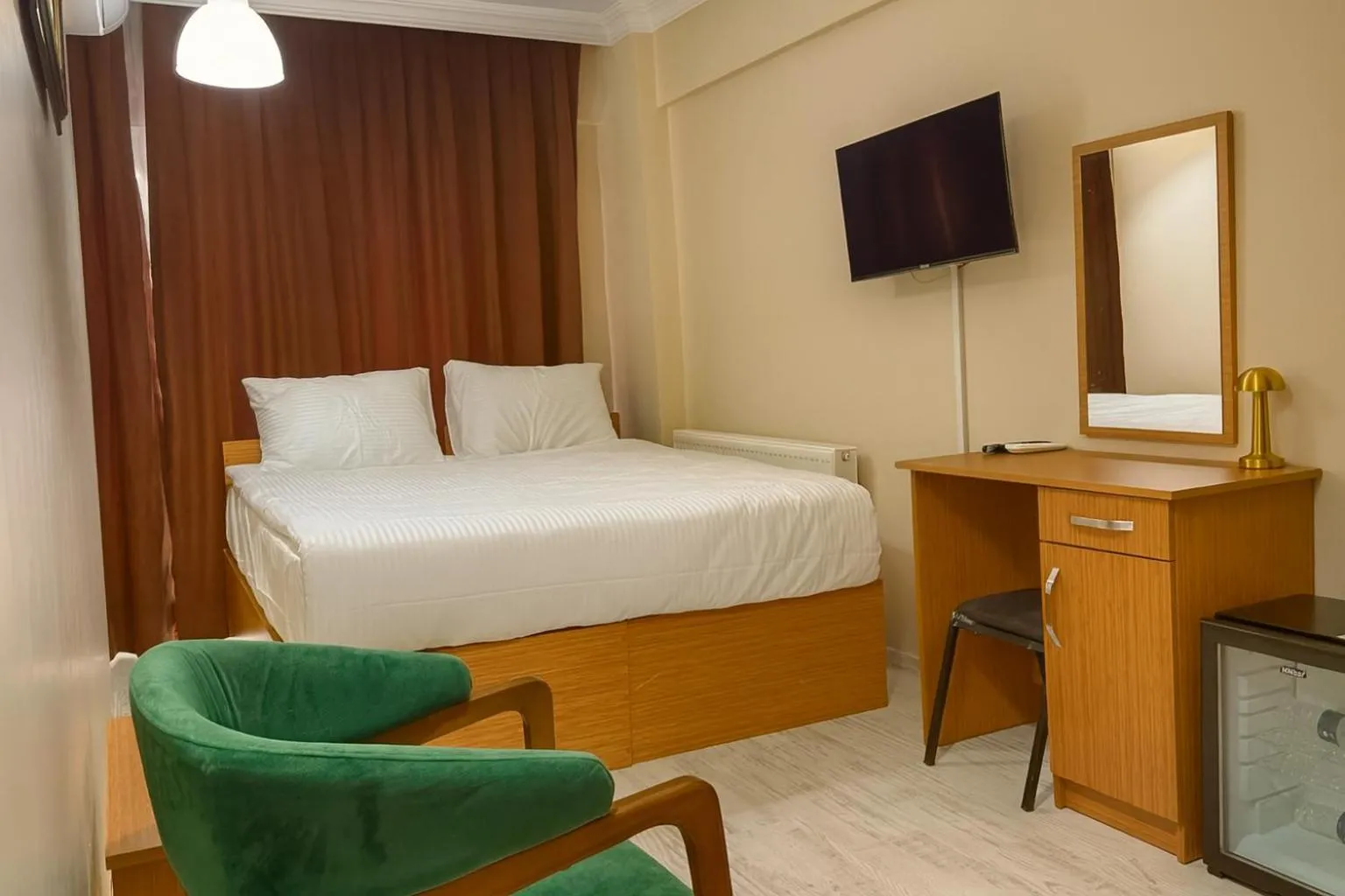Bed in Lion Stone Hotel