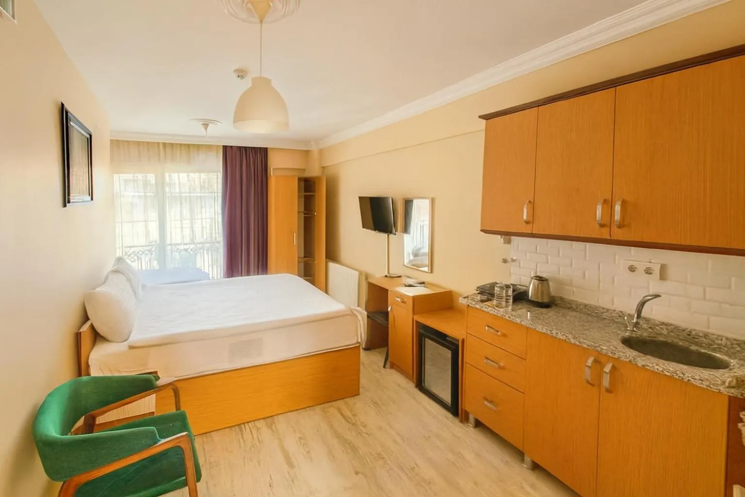 Bed in Lion Stone Hotel