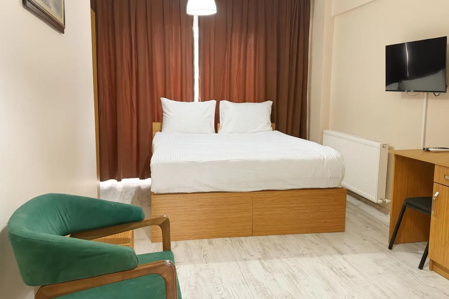 Bed in Lion Stone Hotel