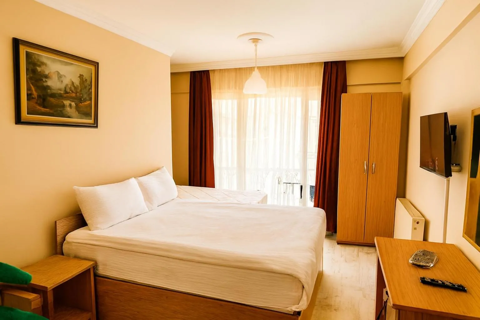 Bed in Lion Stone Hotel