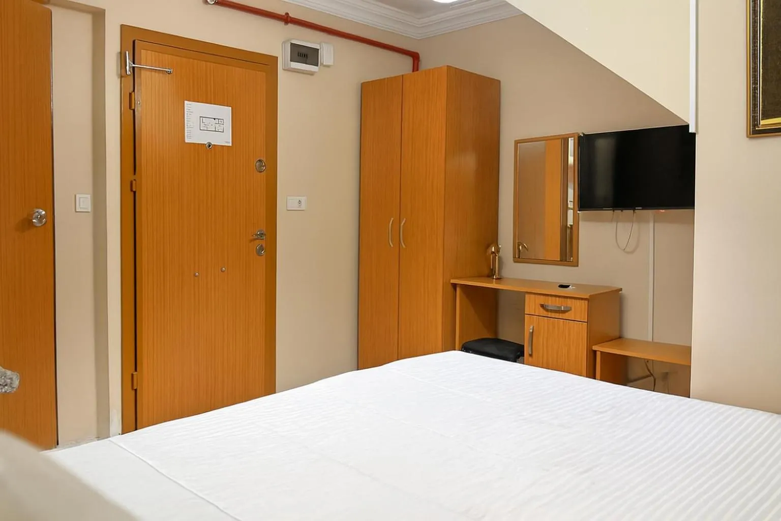 Bed in Lion Stone Hotel
