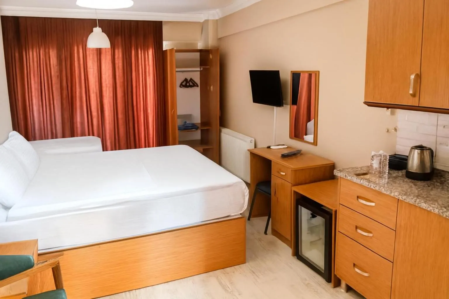 Bed in Lion Stone Hotel