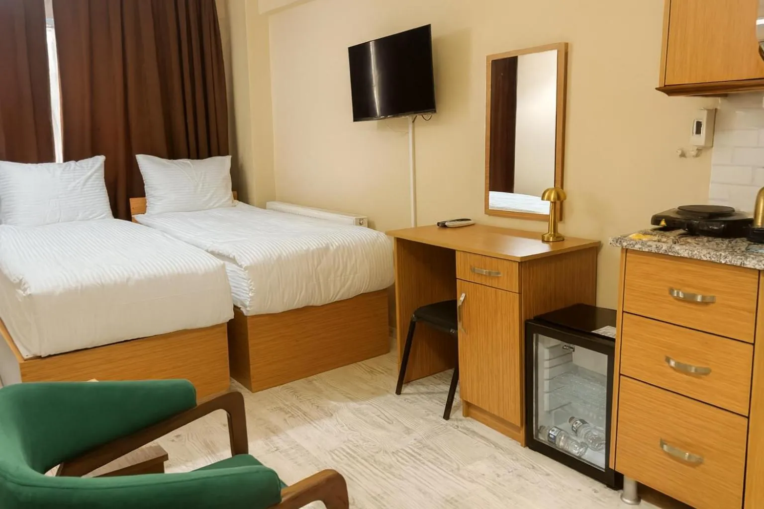 Bed in Lion Stone Hotel