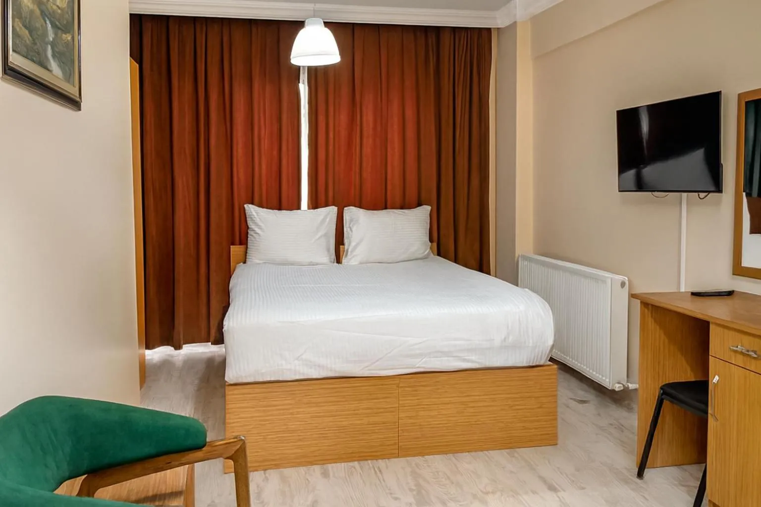 Bed in Lion Stone Hotel