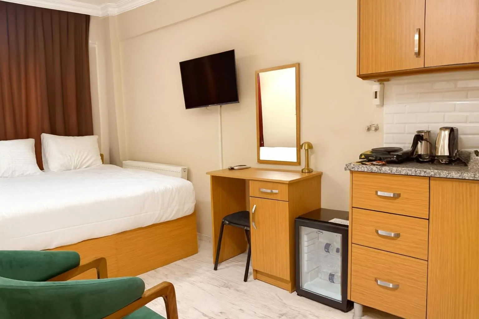 Bed in Lion Stone Hotel