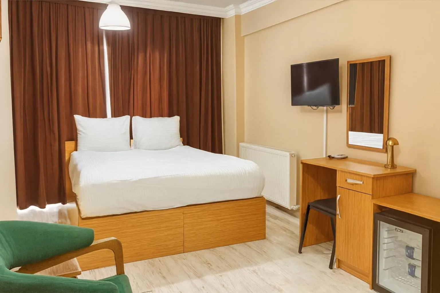 Bed in Lion Stone Hotel