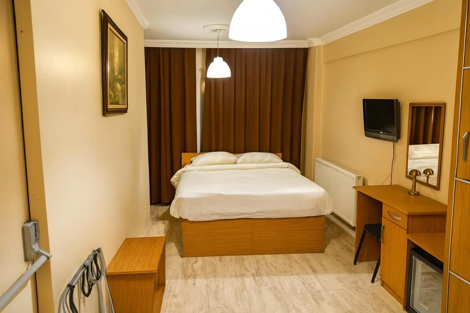 Bed in Lion Stone Hotel