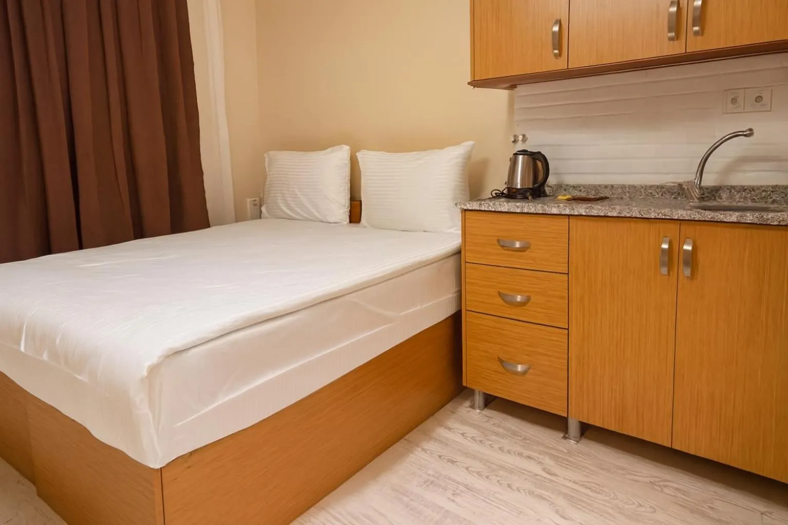 Bed in Lion Stone Hotel