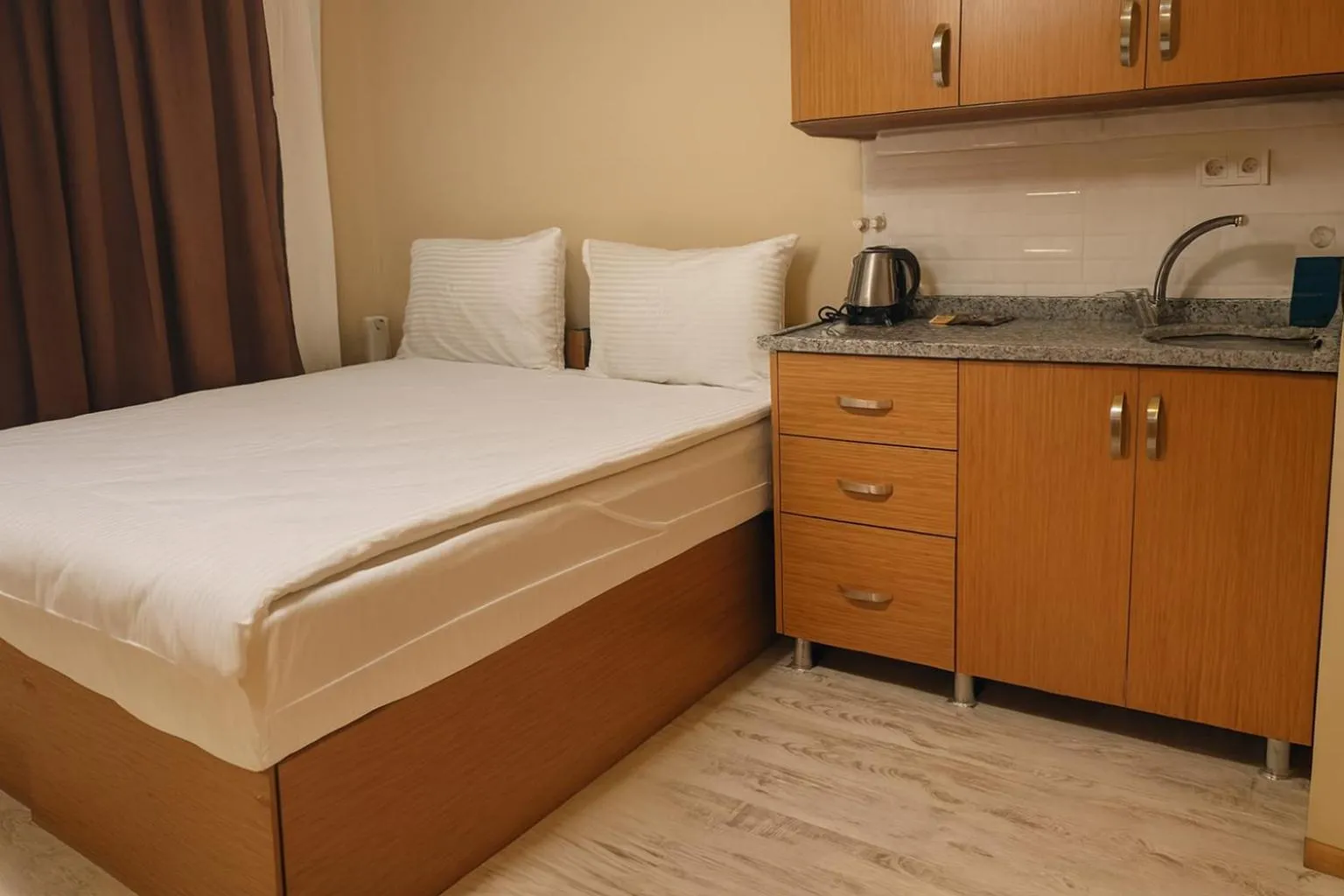 Bed in Lion Stone Hotel