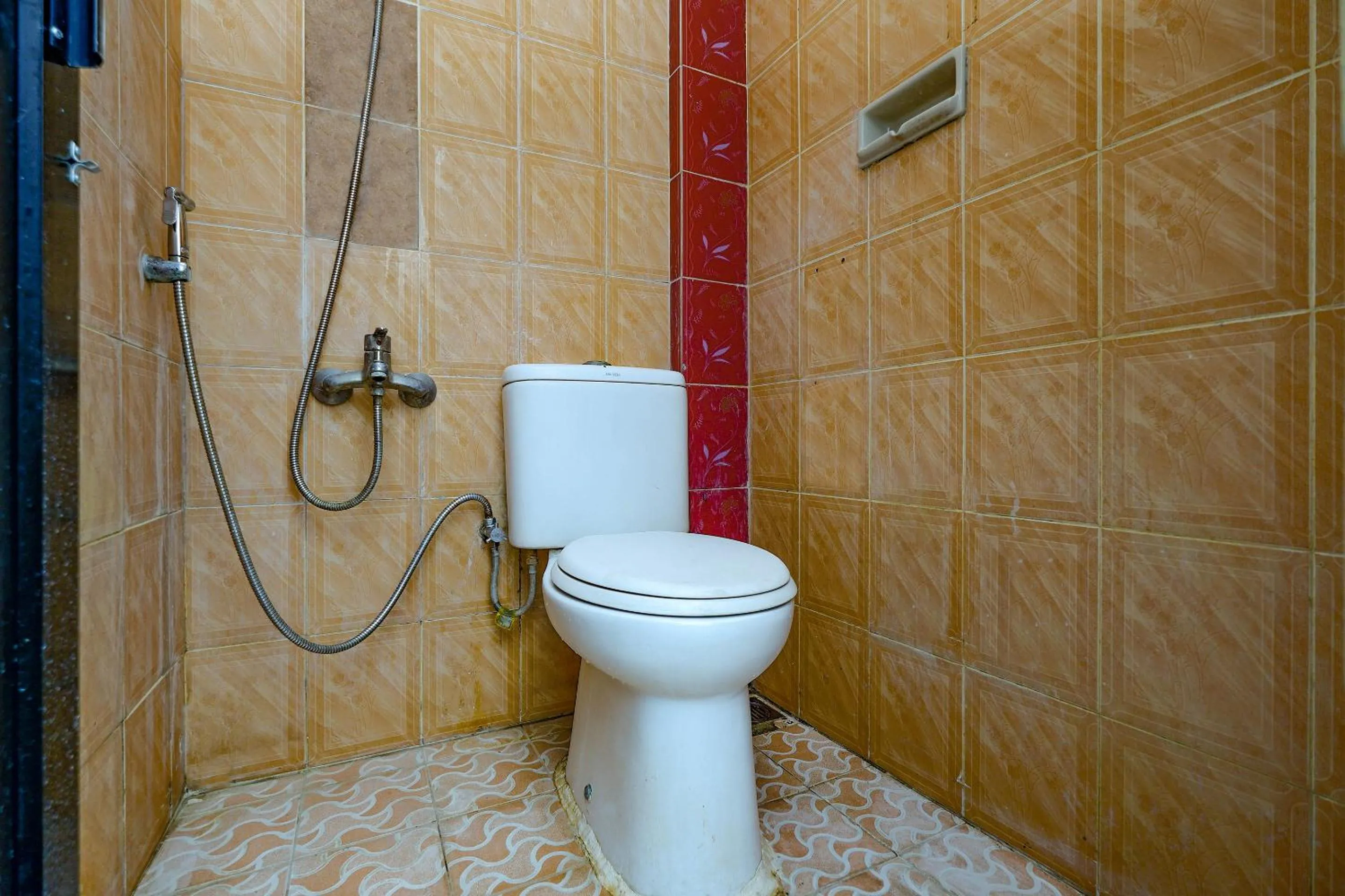 Bathroom in OYO 1706 Hotel H&w Solo