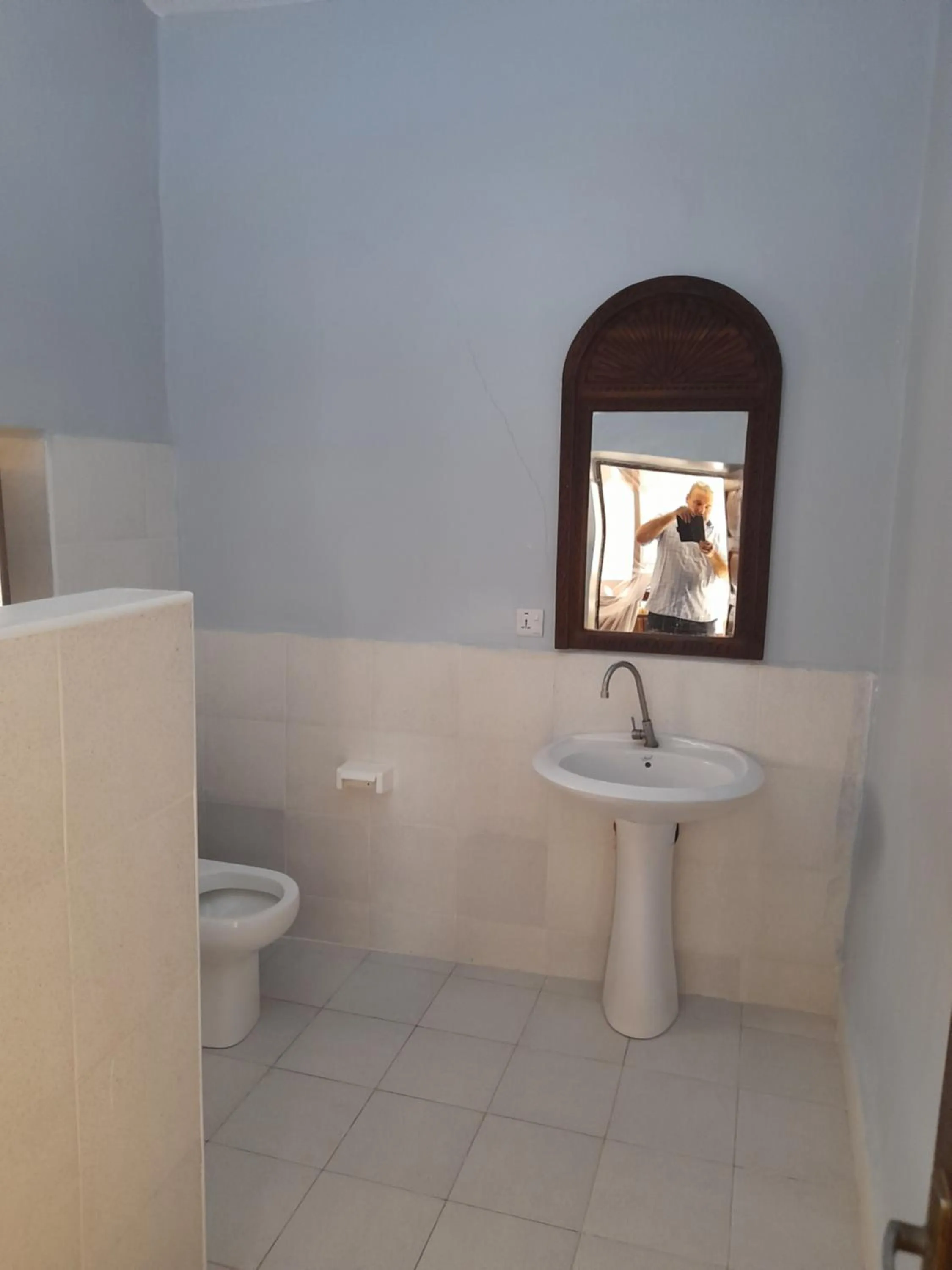 Toilet in Riverman Hotel