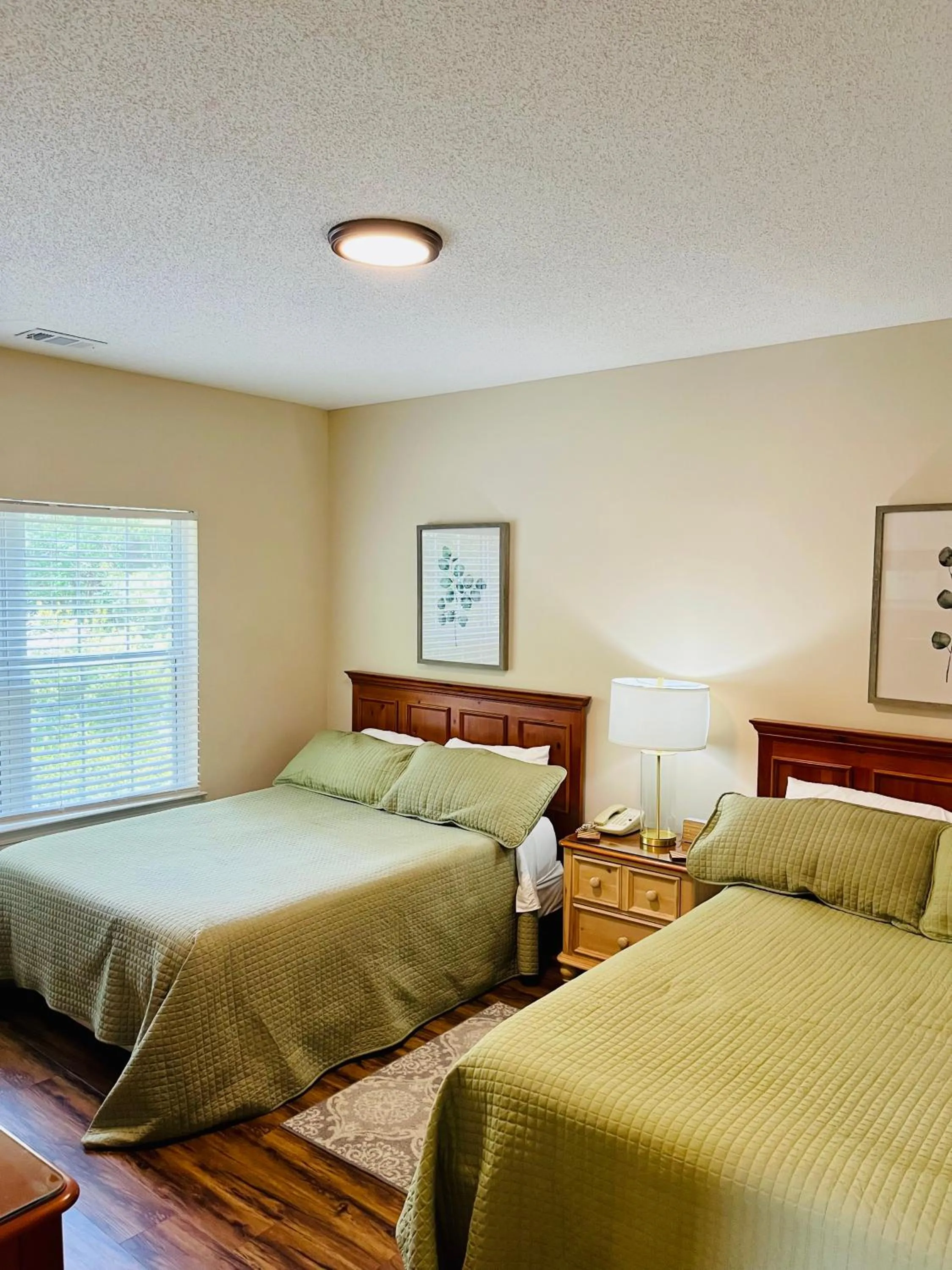 Bed in Two-Bedroom Vacation Condo