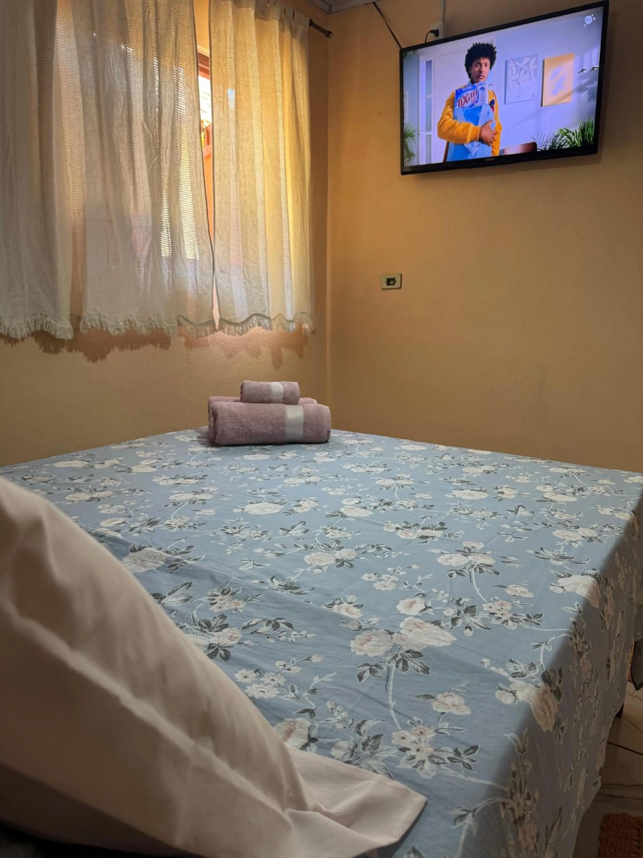 Bed in Pousada do Zezé