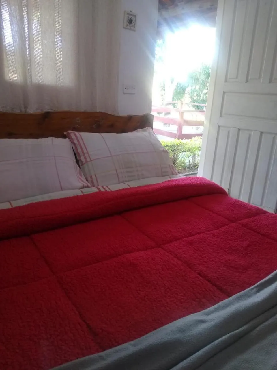 Bed in Pousada do Zezé