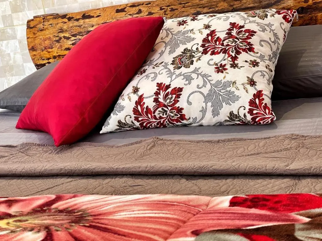 Bed in Pousada do Zezé