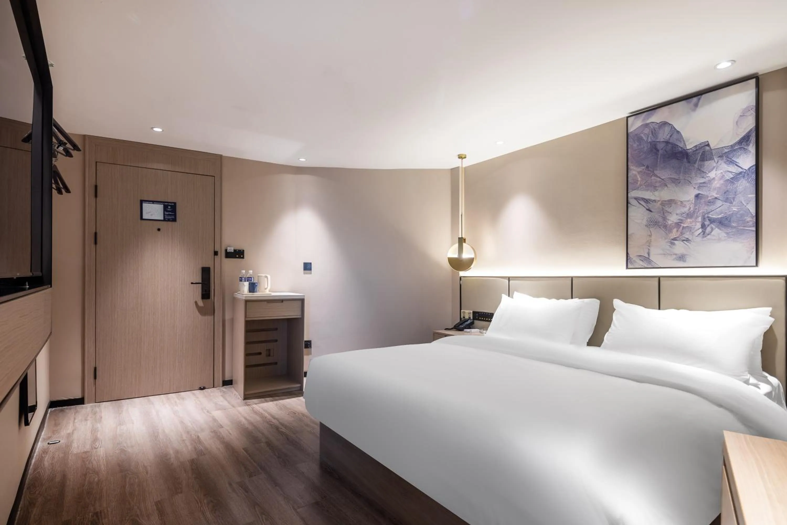 Bed in Xinhuating Business Hotel