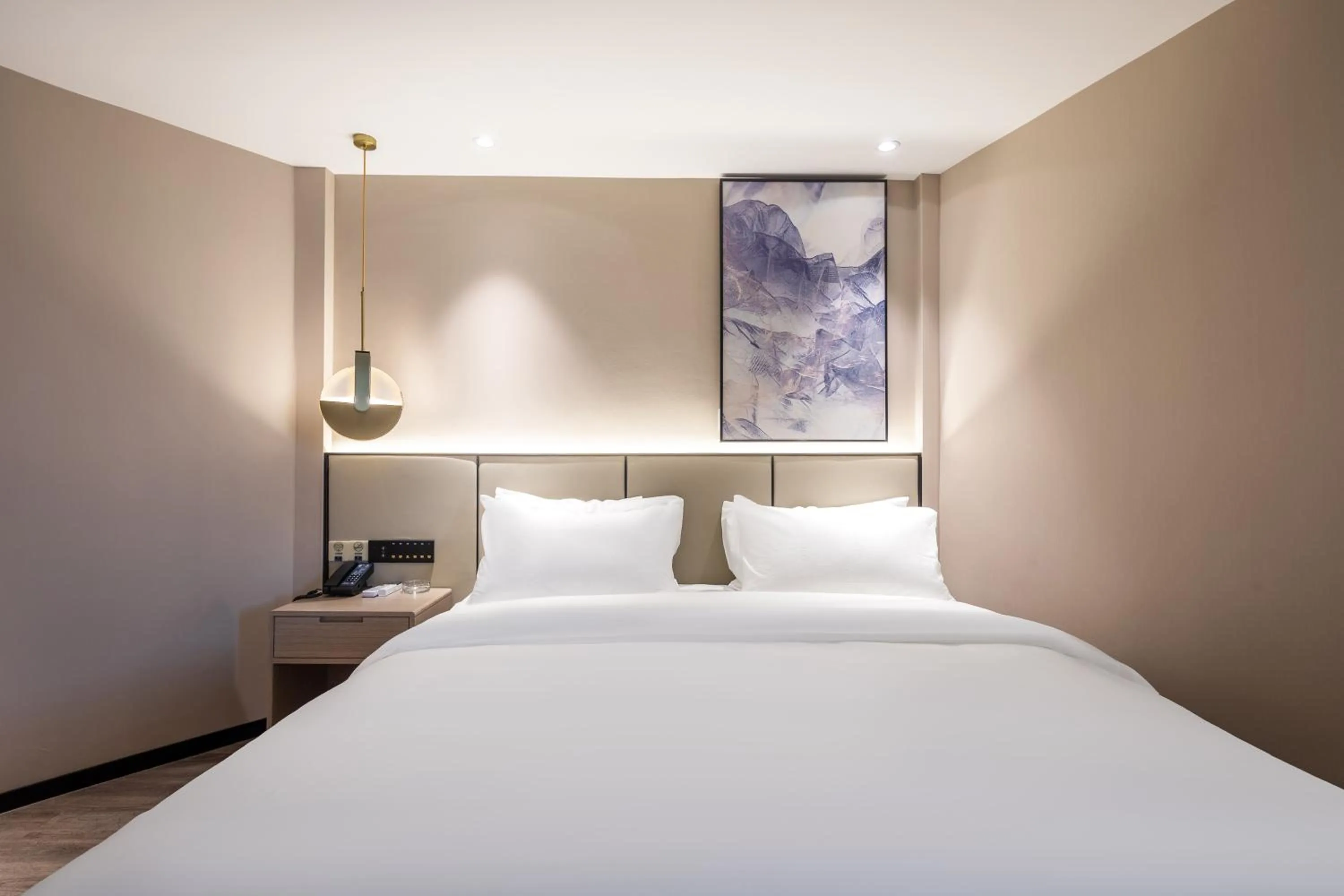 Bed in Xinhuating Business Hotel