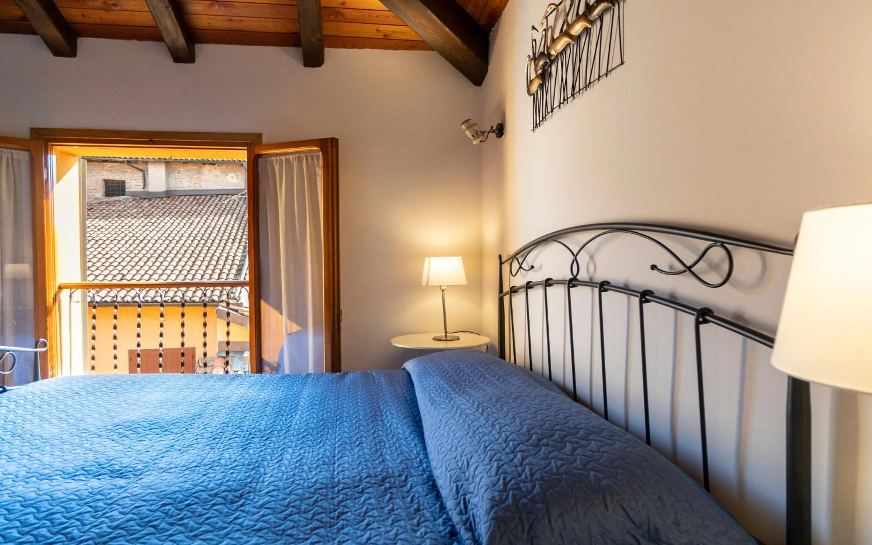 Bed in Residenza Ariosto Depandance by Studio Vita