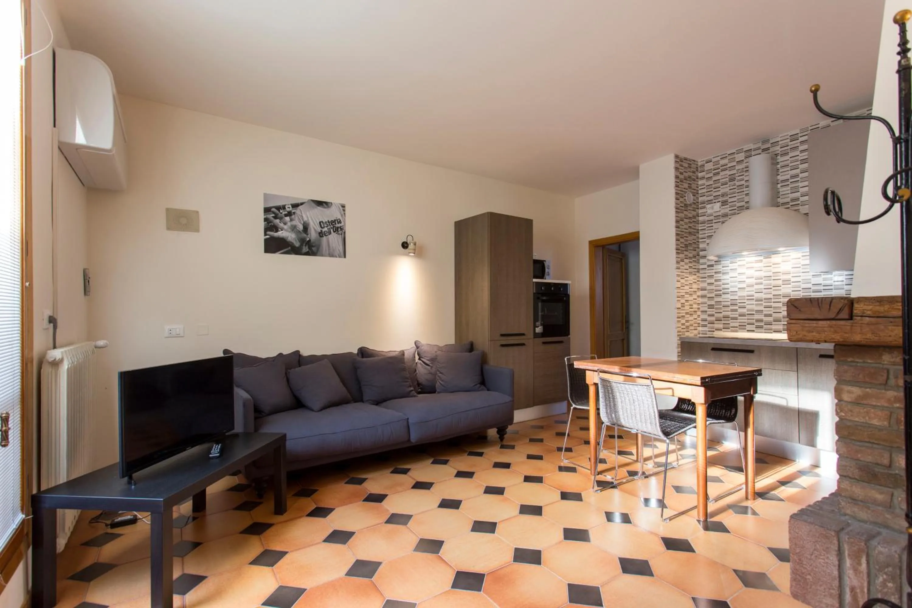 Living room in Residenza Ariosto Depandance by Studio Vita