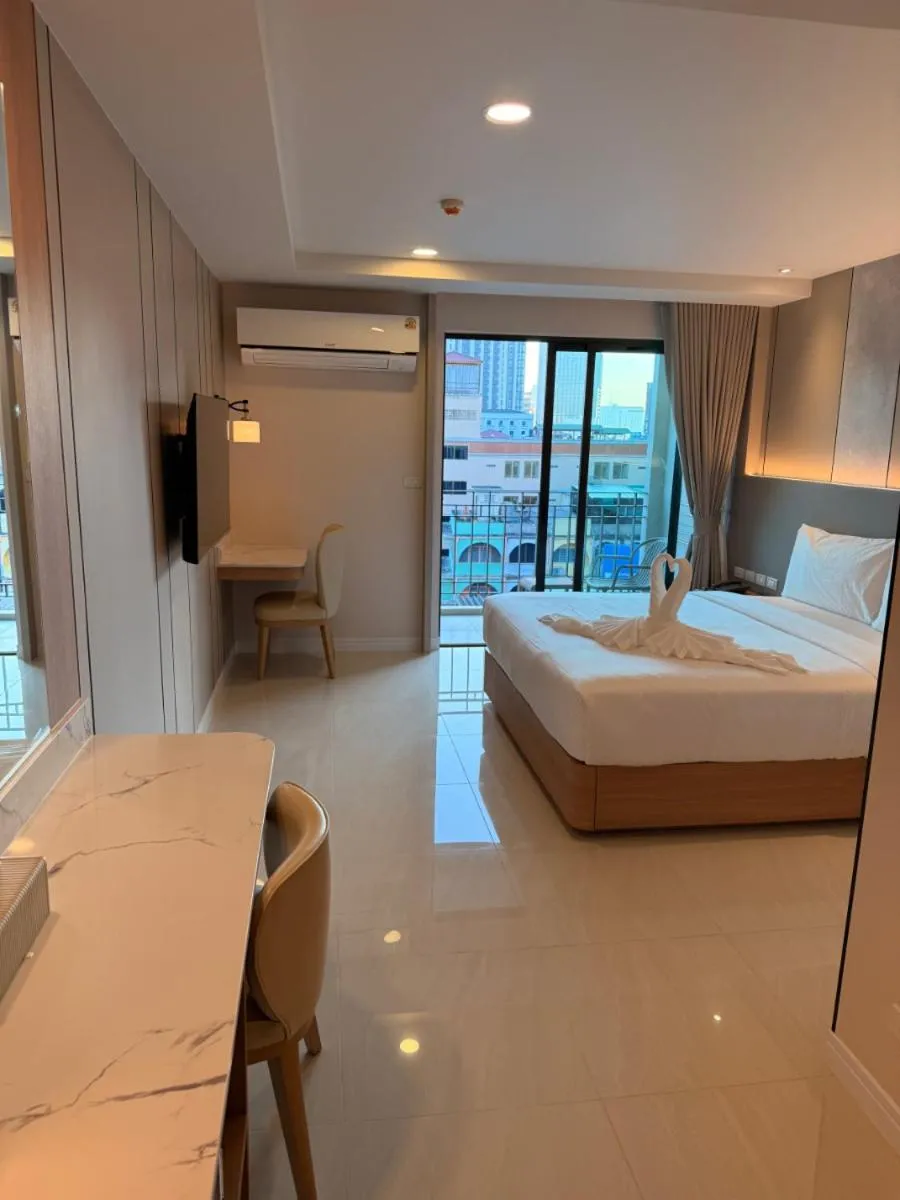 Bed in Aston Hotel Pattaya