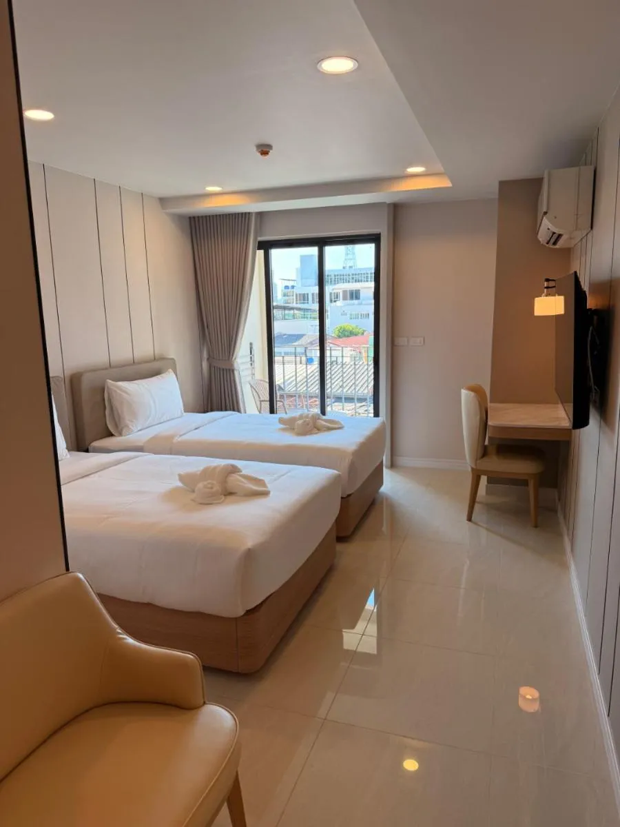 Bed in Aston Hotel Pattaya