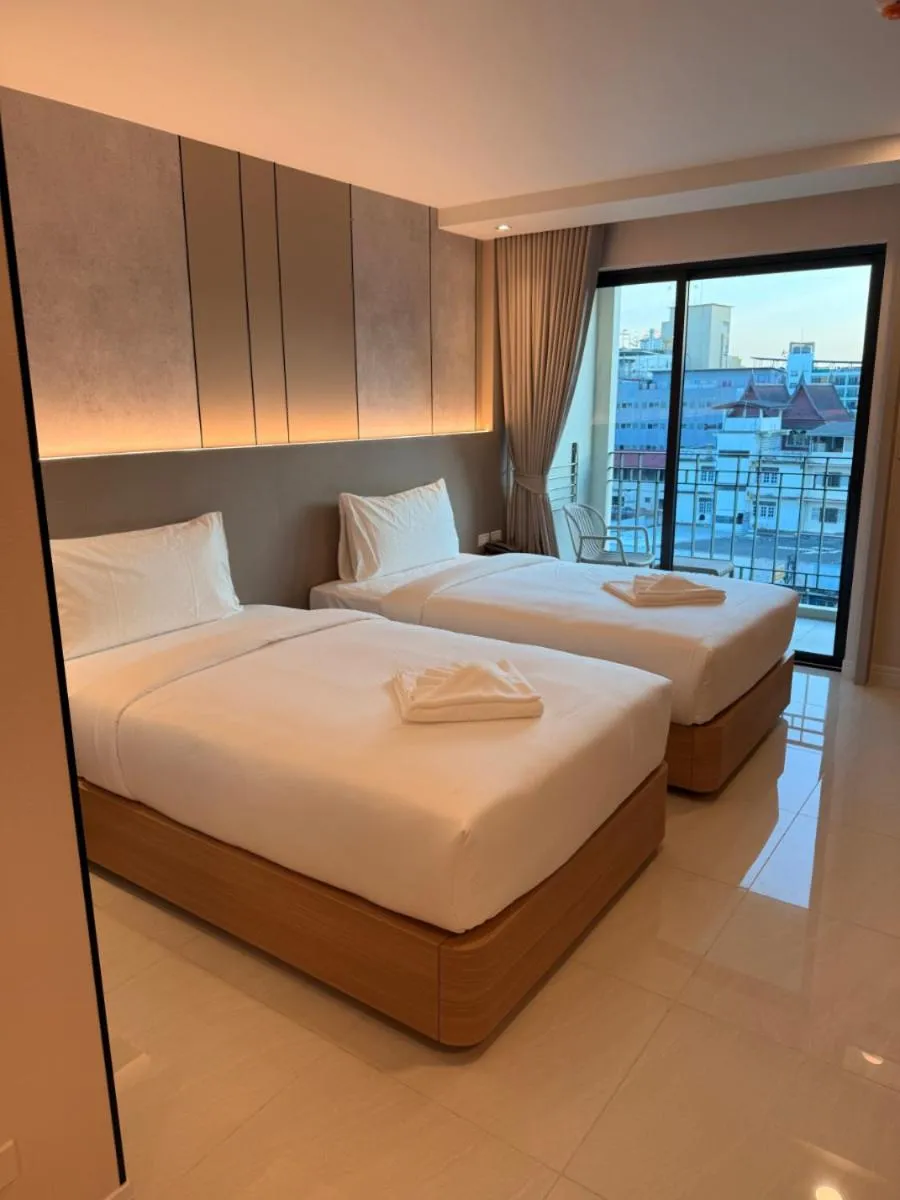 Bed in Aston Hotel Pattaya