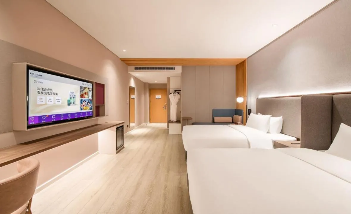 Bed in Mecure Hotel Nantong Central Business District
