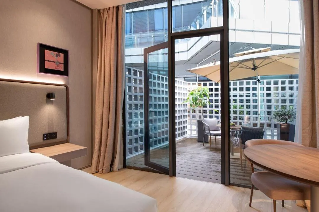Bed in Mecure Hotel Nantong Central Business District