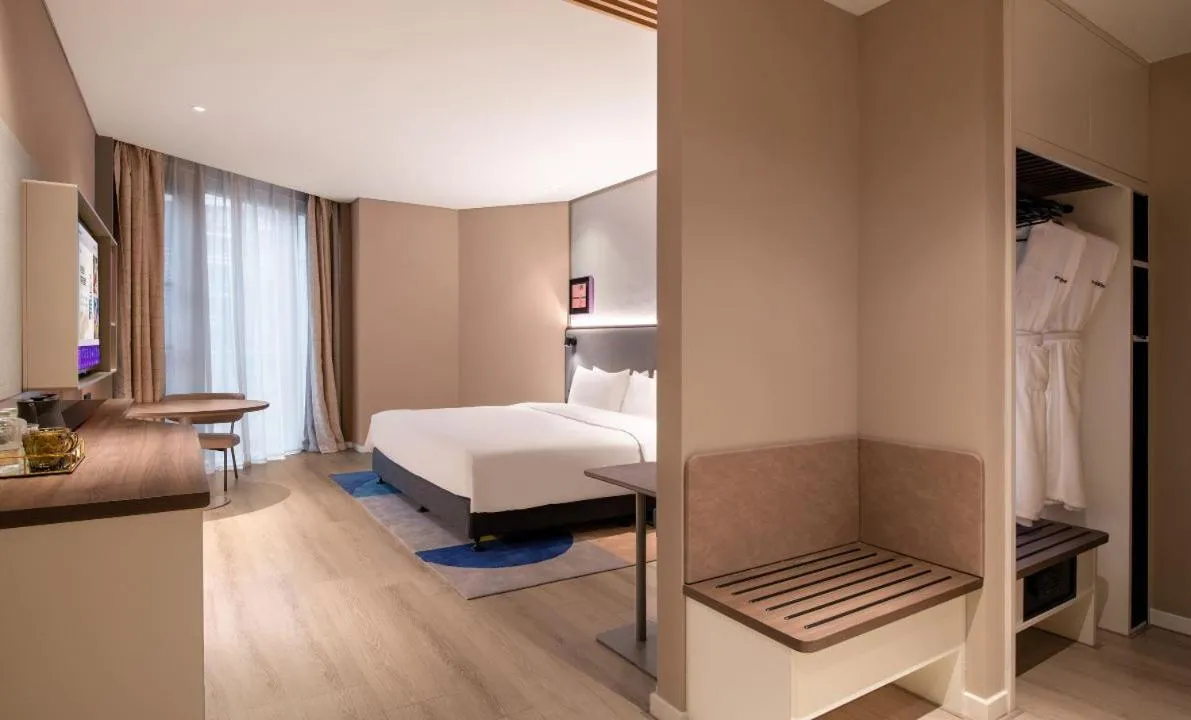 Bed in Mecure Hotel Nantong Central Business District
