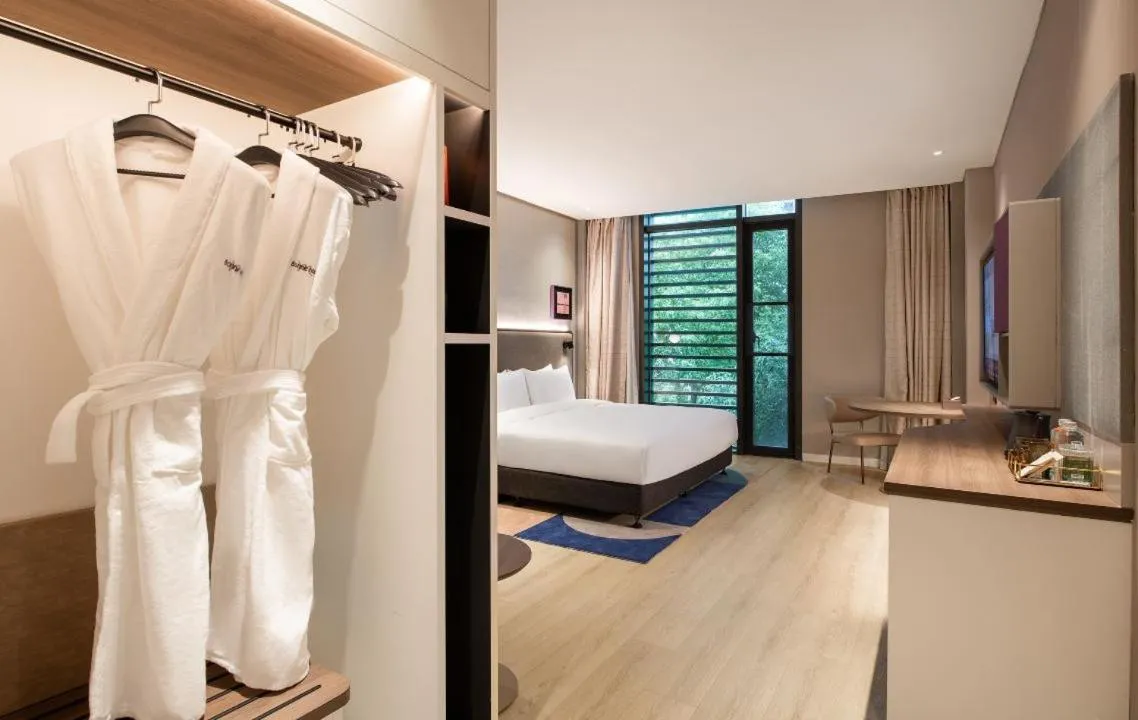 Bed in Mecure Hotel Nantong Central Business District