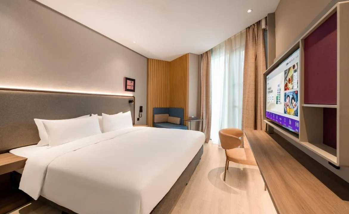Bed in Mecure Hotel Nantong Central Business District