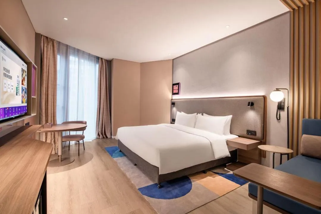 Bed in Mecure Hotel Nantong Central Business District