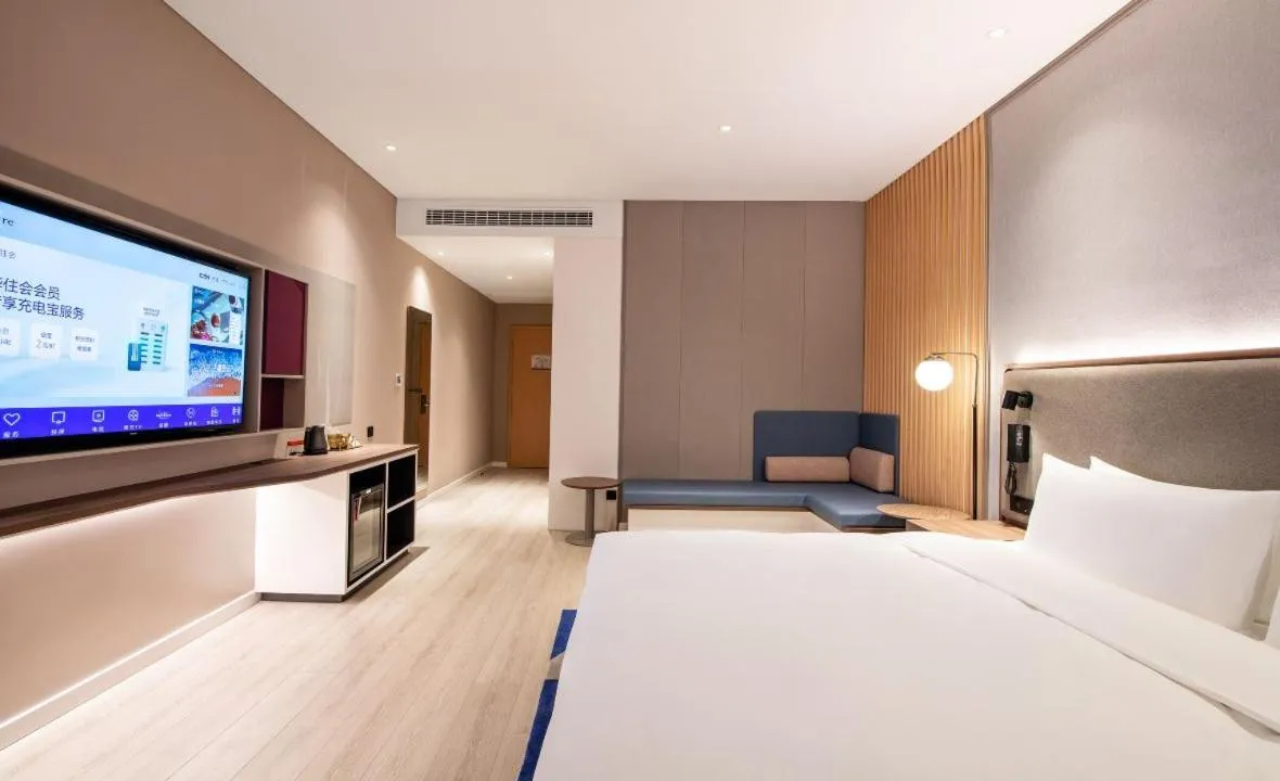 Bed in Mecure Hotel Nantong Central Business District