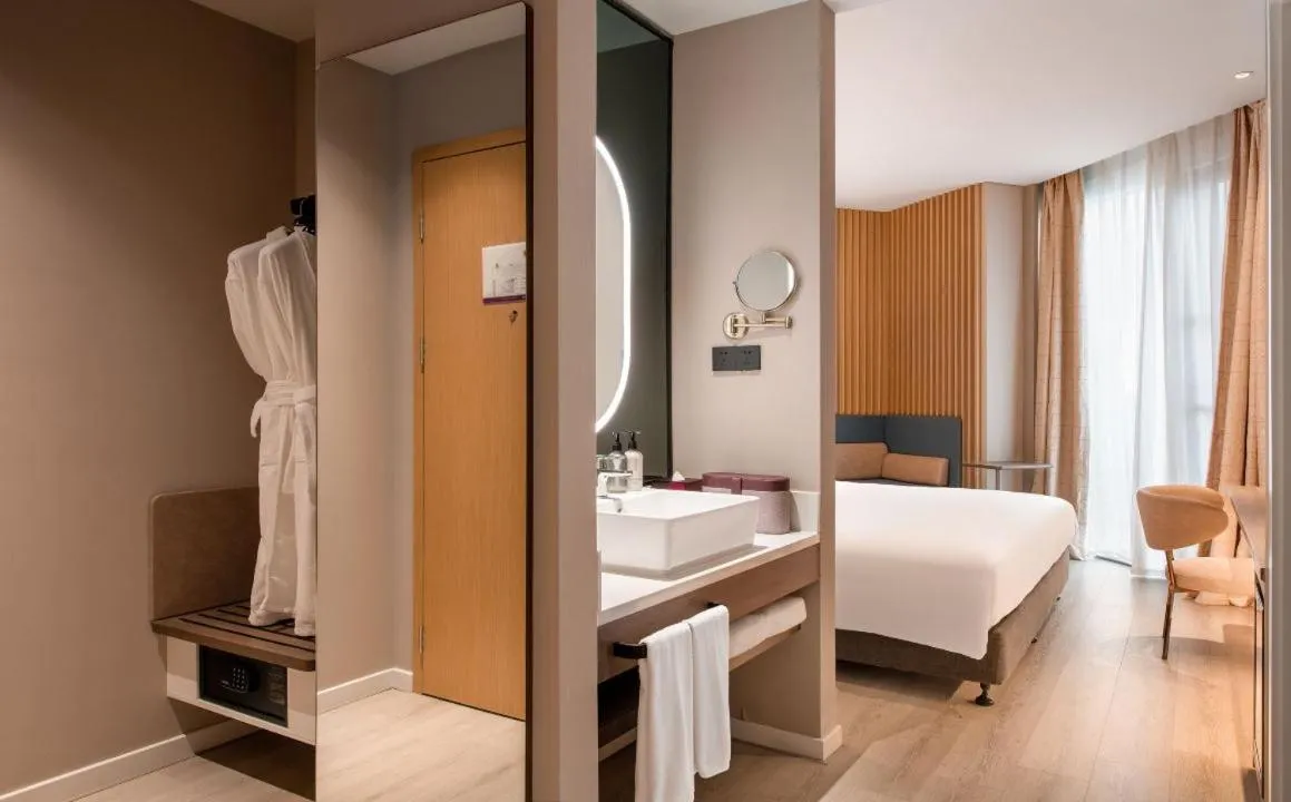 Bed in Mecure Hotel Nantong Central Business District