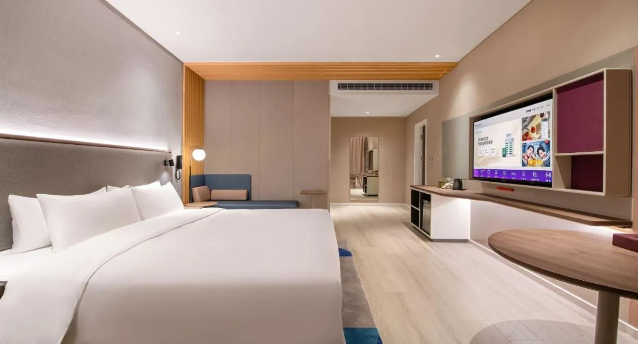Bed in Mecure Hotel Nantong Central Business District