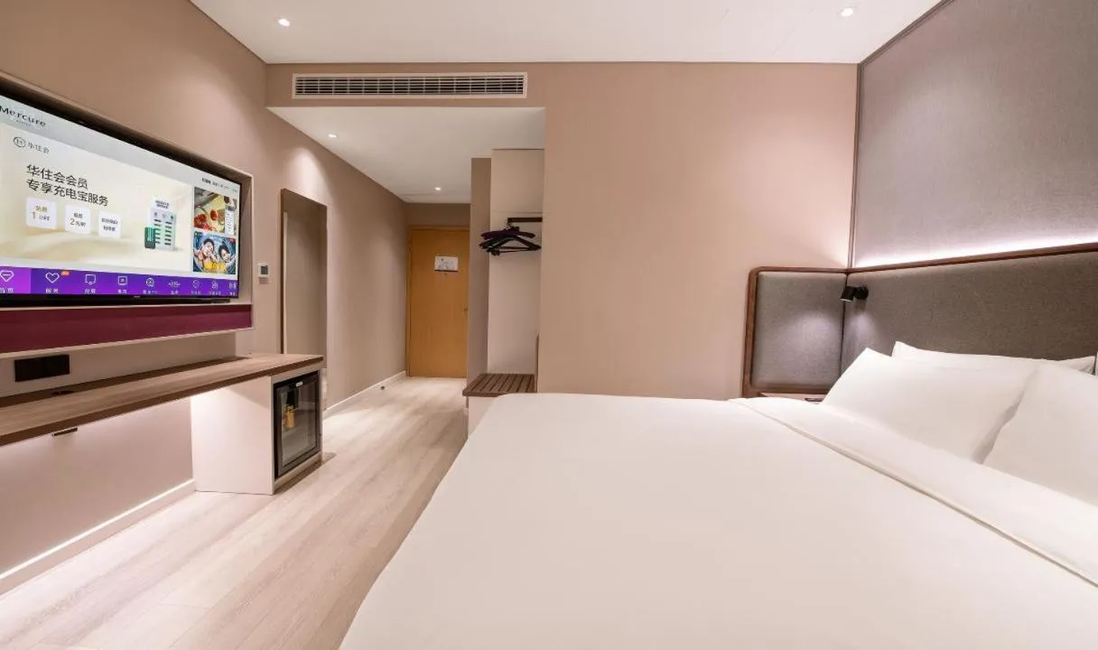 Bed in Mecure Hotel Nantong Central Business District