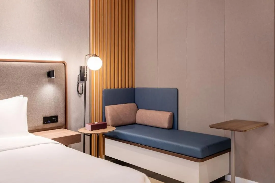 Bed in Mecure Hotel Nantong Central Business District