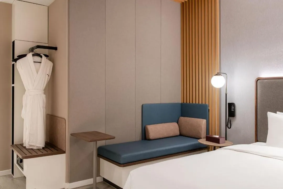 Bed in Mecure Hotel Nantong Central Business District