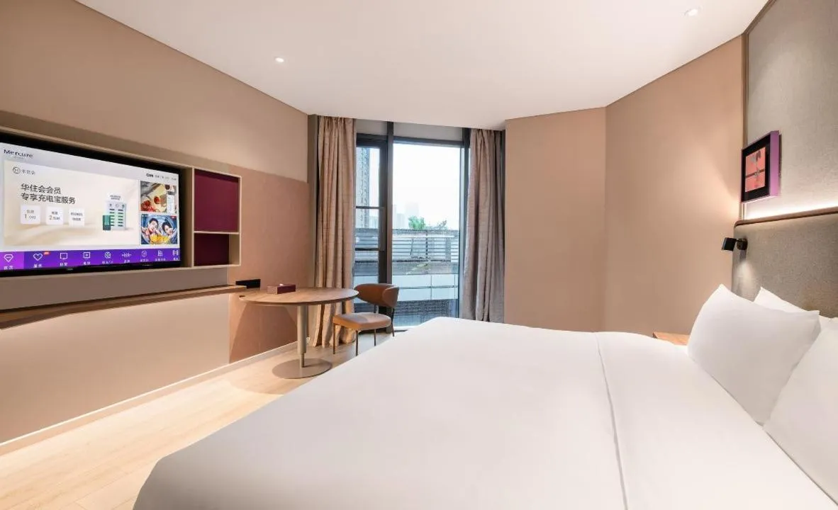 Bed in Mecure Hotel Nantong Central Business District