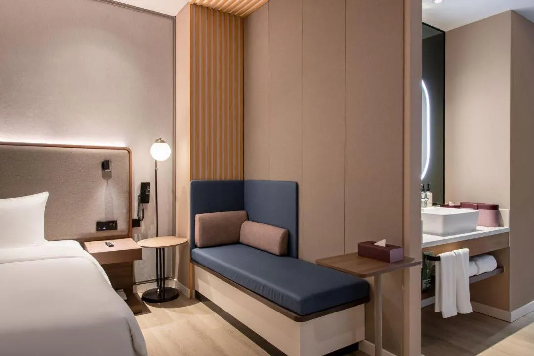 Bed in Mecure Hotel Nantong Central Business District