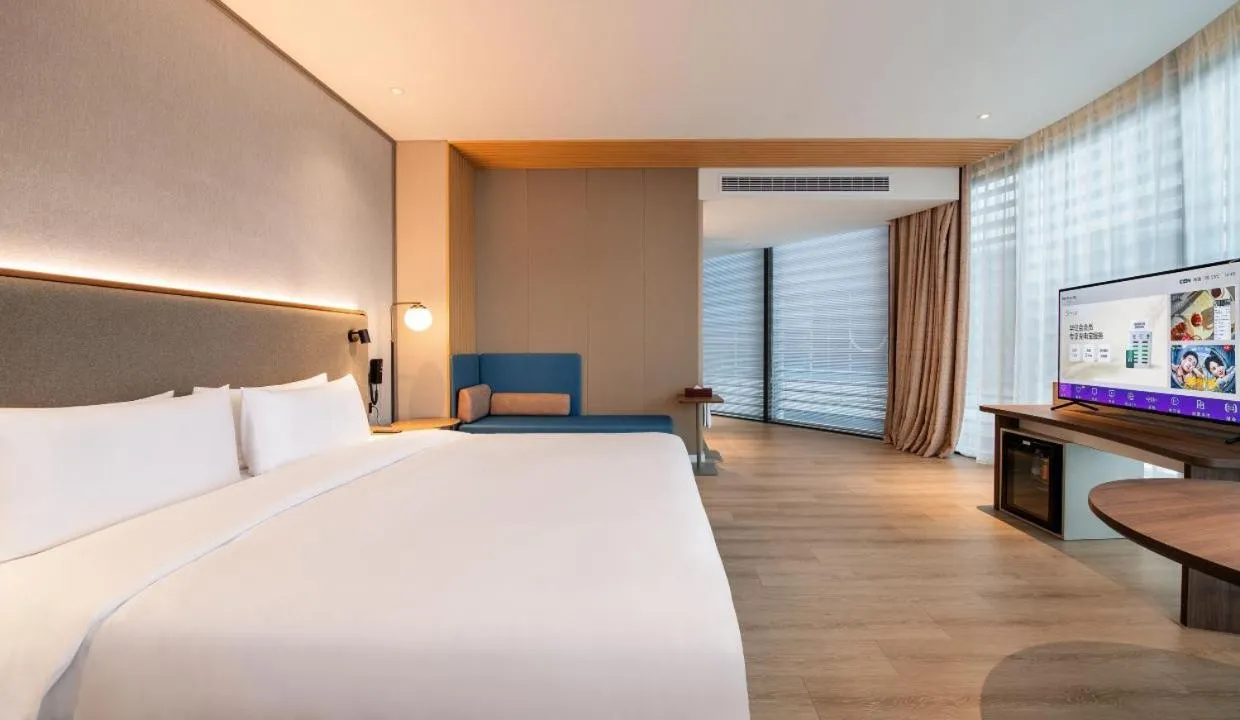 Bed in Mecure Hotel Nantong Central Business District