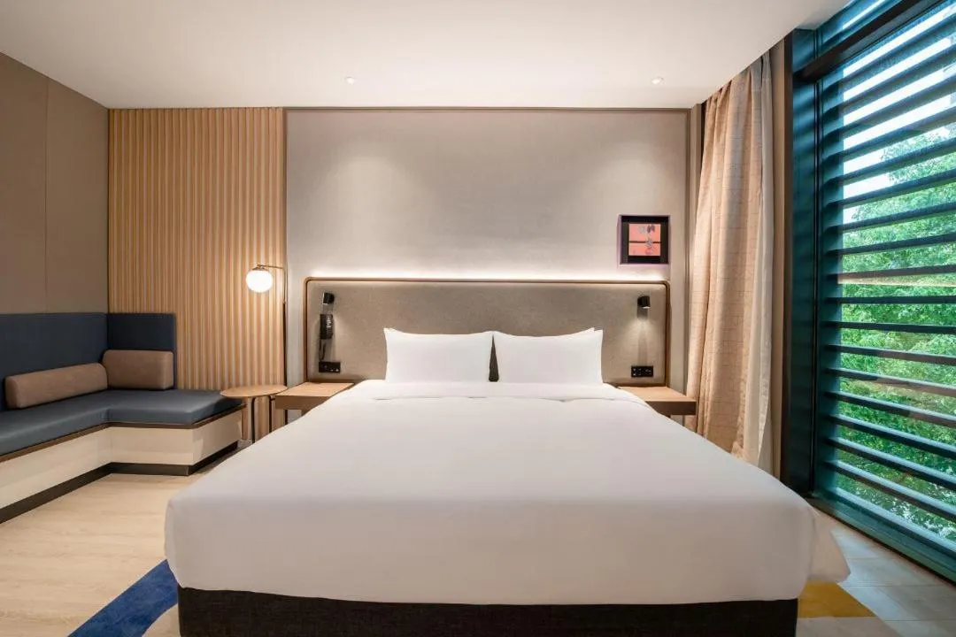 Bed in Mecure Hotel Nantong Central Business District