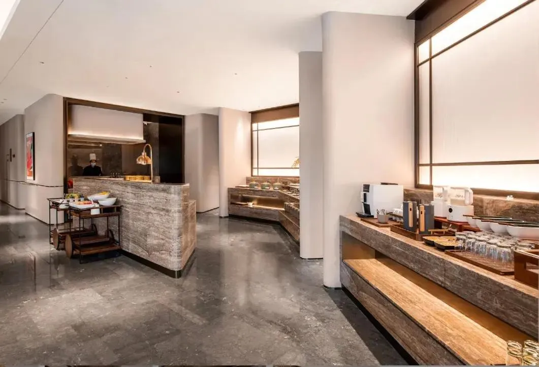 Bed in Mecure Hotel Nantong Central Business District