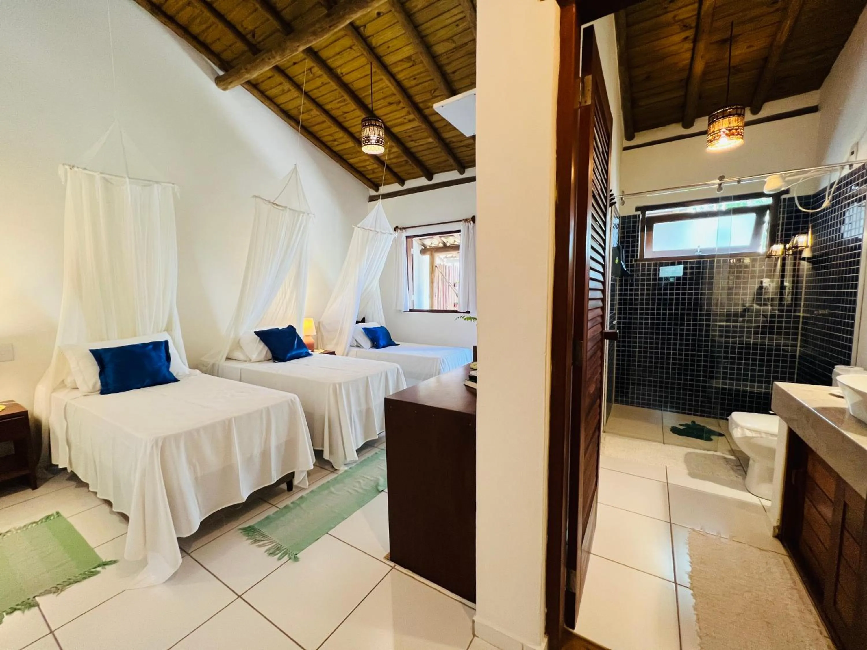 Bed in Pousada Pandoro