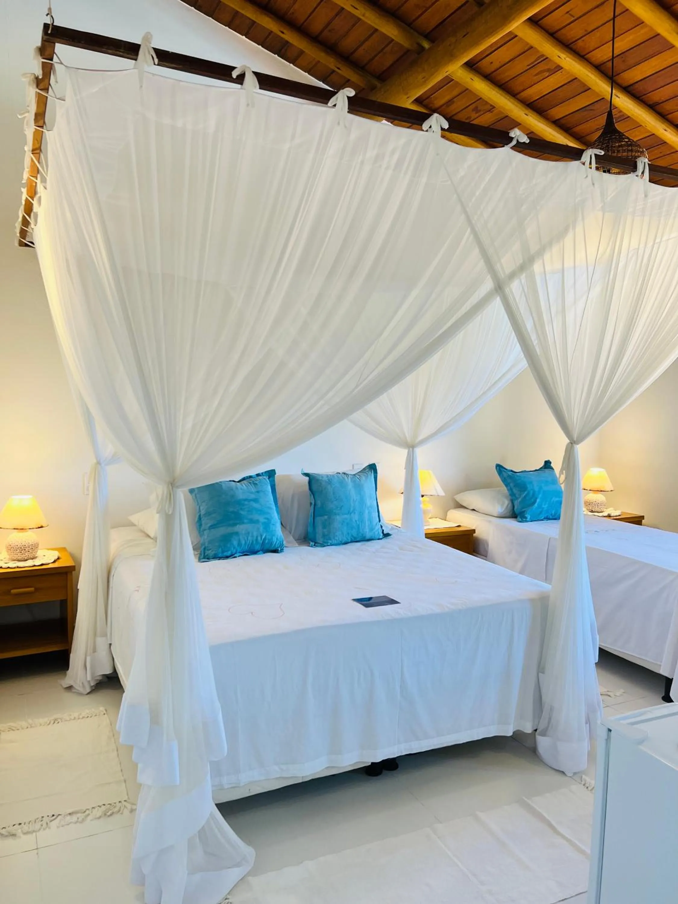 Bed in Pousada Pandoro